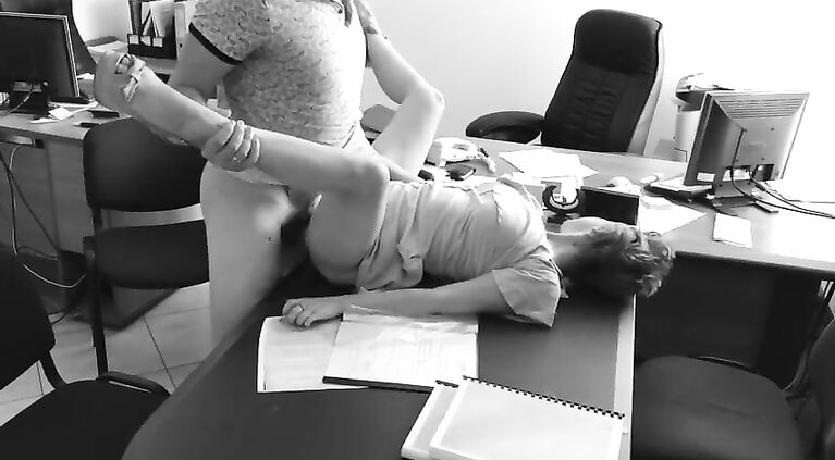 The boss fucks his tiny secretary on the office table and films it on hidden camera