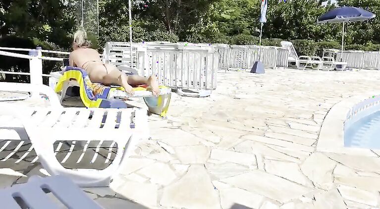 She noticed that I was jerking off and helped me cum right next to the public pool