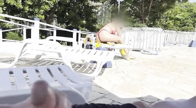 She noticed that I was jerking off and helped me cum right next to the public pool