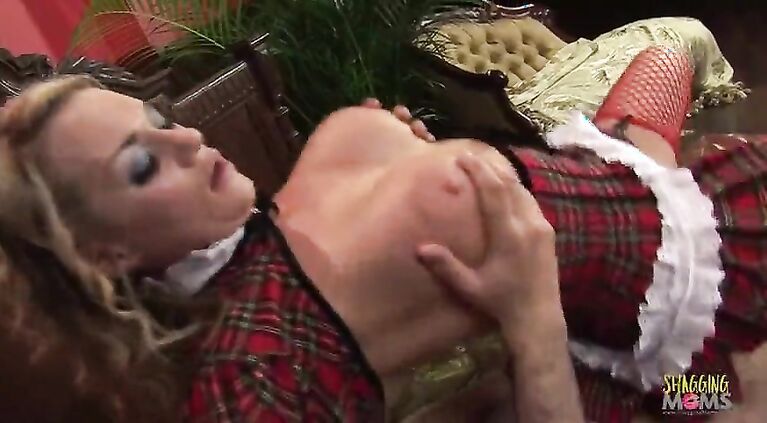 Babe in plaid uniform sucking and riding a long dong