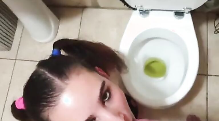 Teen taking for a piss and sucking his cock