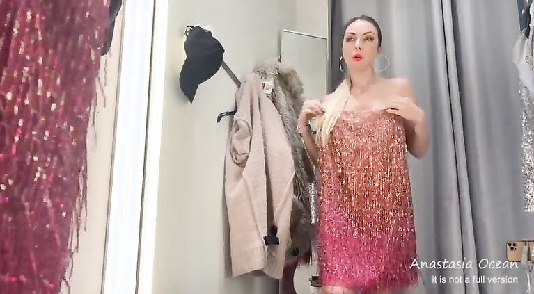 Fitting room. Hot slut tries on clothes on her hot body in a public place. Public. Shopping center.