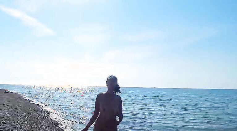 Naked on the beach